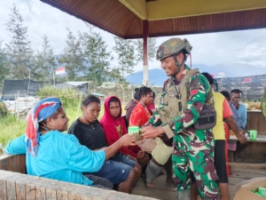 Satgas Yonif 700/WYC Pos Eromaga Gelar Minggu Kasih, Sejuk Damai di Tanah Puncak