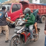 HSB Bagikan Ratusan Nasi Kotak dan Masker di Bawah Flyover Bandara Palembang